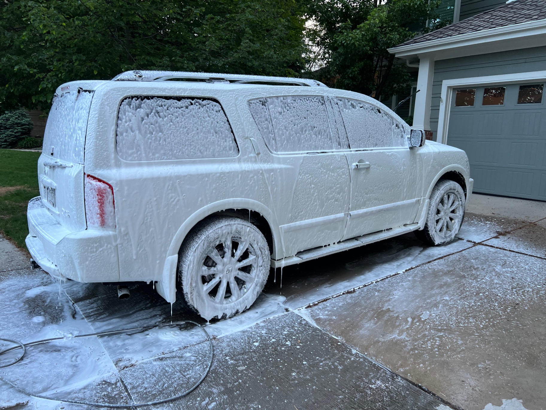Foam cannon wash on luxury SUV